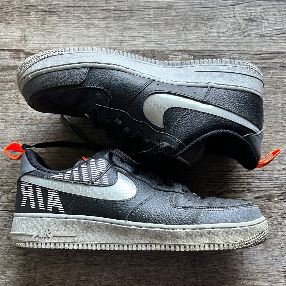 Nike Men's Black and Gray Low-Top Sneakers with Orange Pull Tabs
